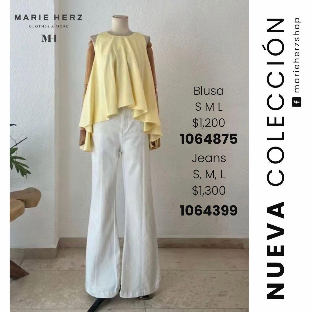 1064874 Blusa amarilla asimétrica