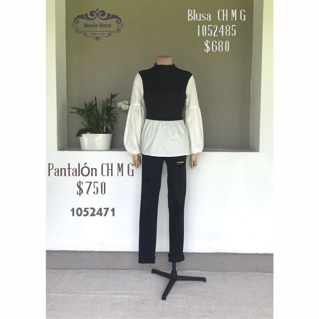 1052471 Jeans negros rotos